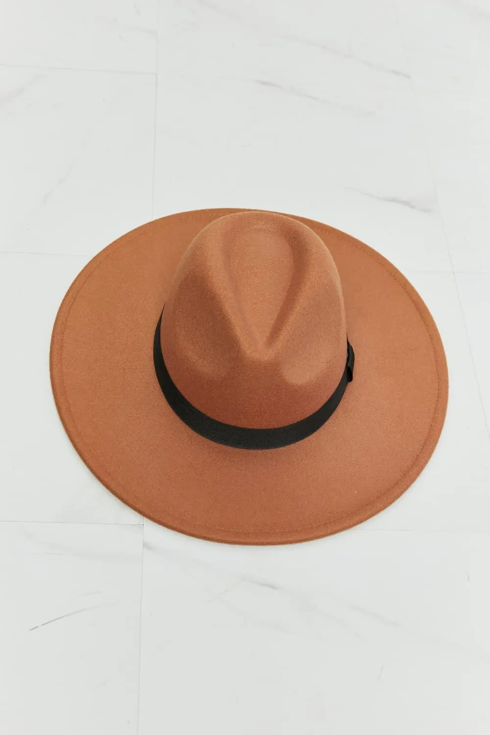 Chic Tan Fedora with Stylish Black Ribbon Accent