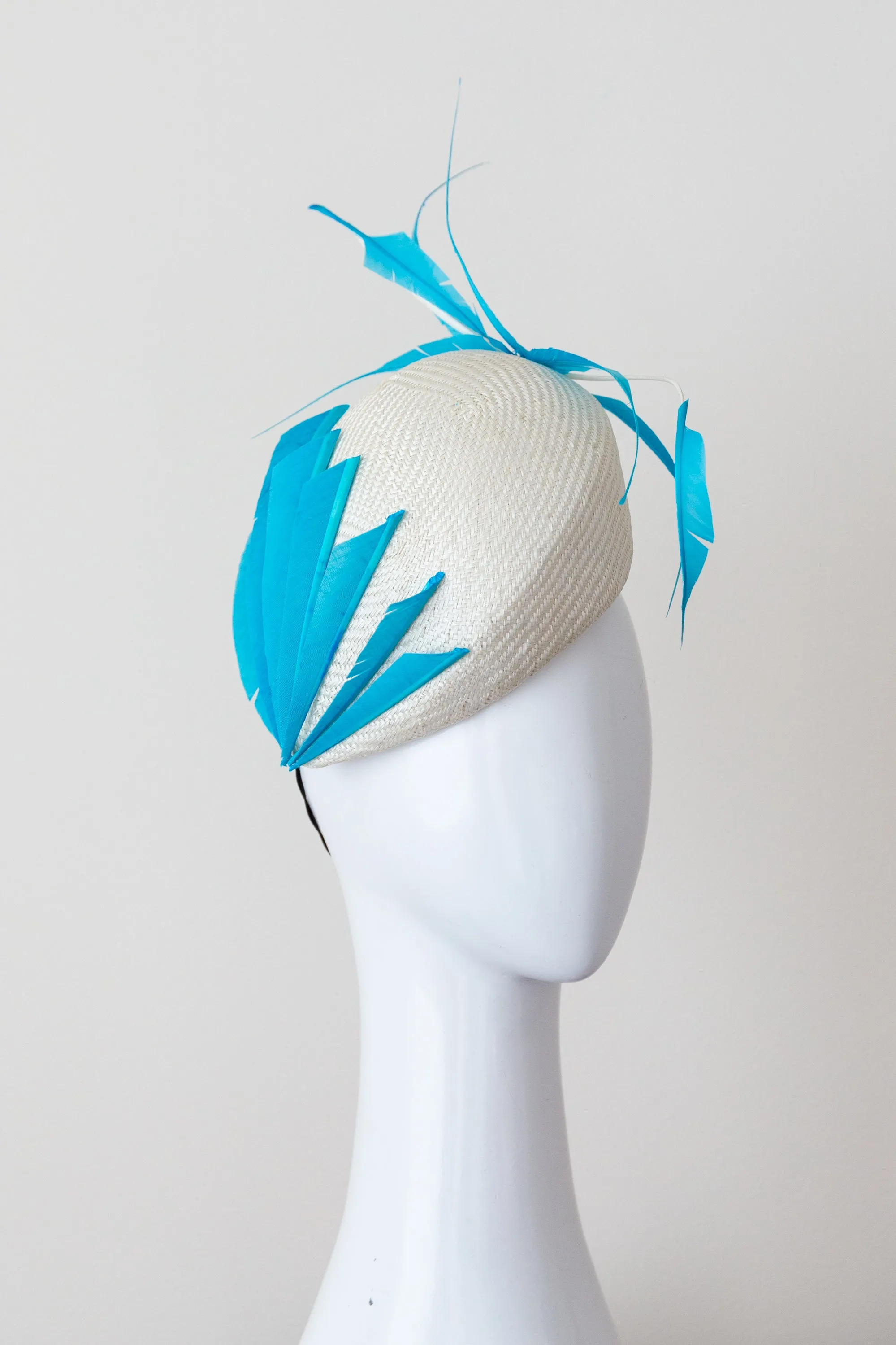 Raised Side Beret with Sky Blue Sculptured Feathers